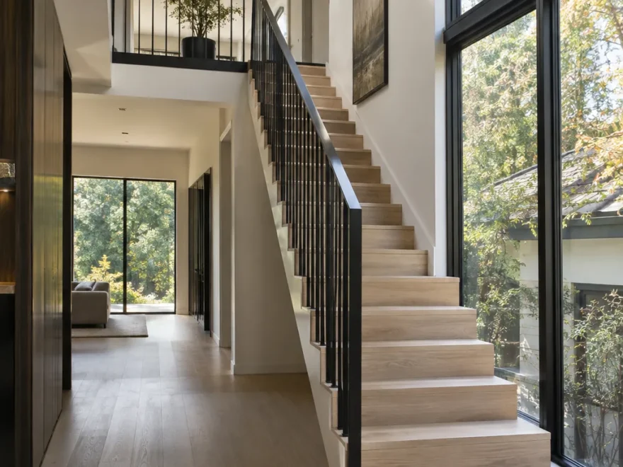 Oak Staircase Beside Tall Window